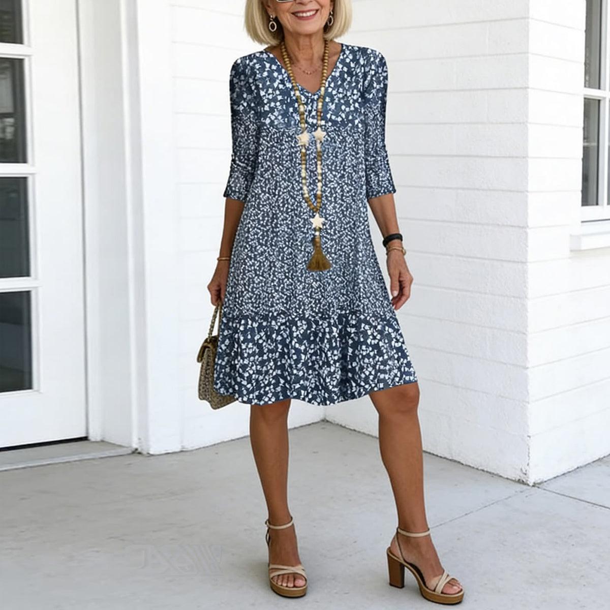 Women's blue floral print V-neck ruffle hem midi dress, front view