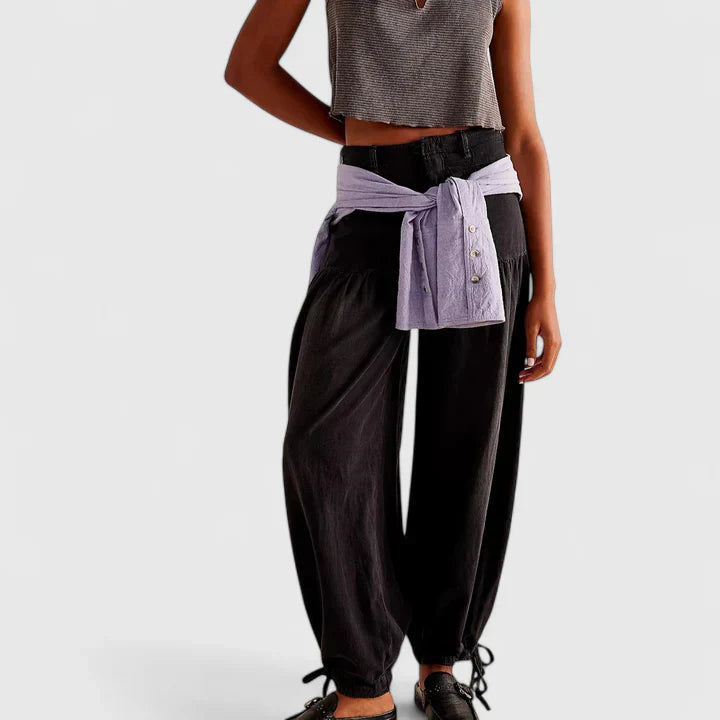 Women's flowing wide leg trousers, close-up view