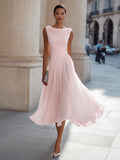 Draped neck midi dress in white, elegant neckline close up