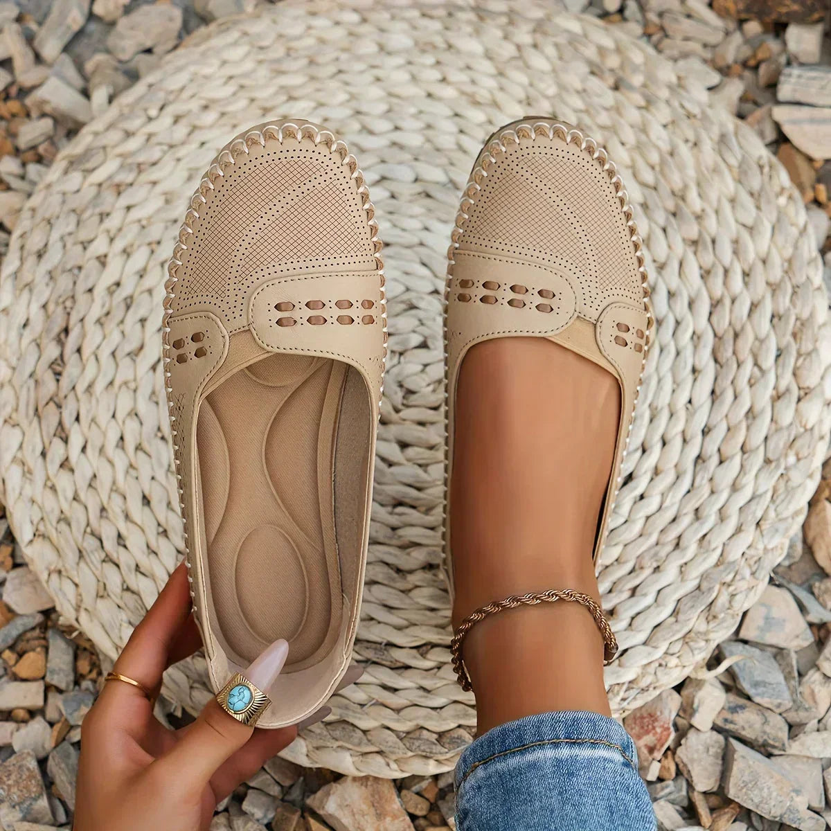 Women's flat slip-on loafers in beige, side view