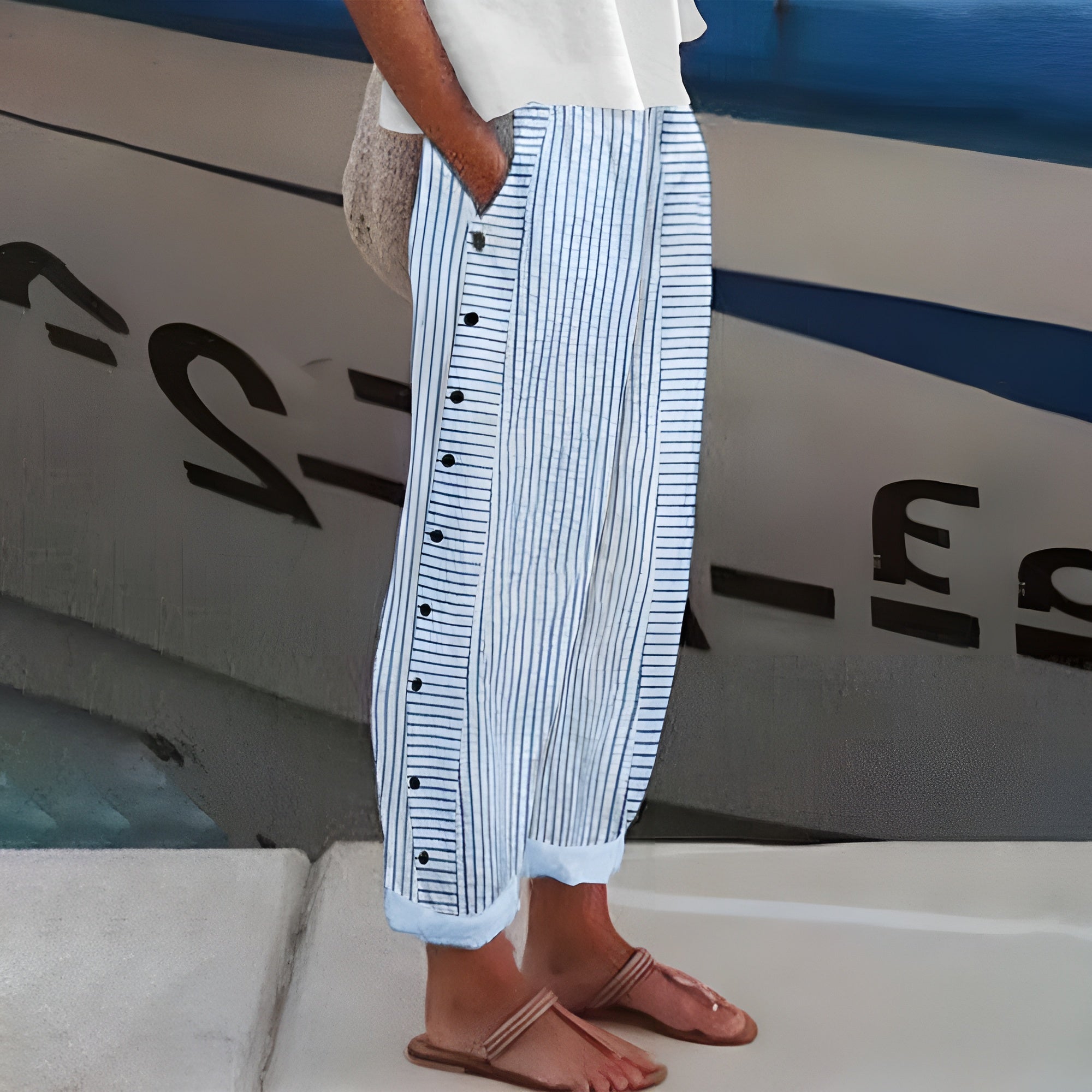 Women's stripe panel button detail trousers, front view