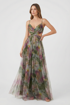 Women's watercolour floral dress styled for a wedding occasion