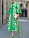 Green floral print maxi dress with flared bell sleeves and V-neckline, front view on model