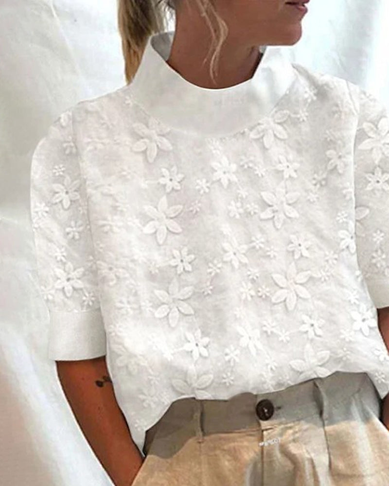 Floral embroidered high-neck blouse in white, tone-on-tone detail | Alba Muse