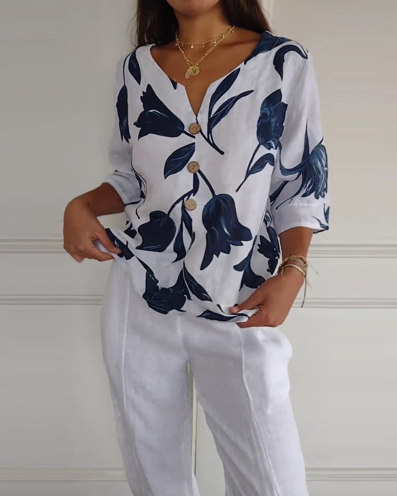 Three quarter sleeve floral blouse, full view