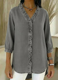 Casual denim V-neck ruffled shirt in light blue, feminine ruffle detail | Alba Muse