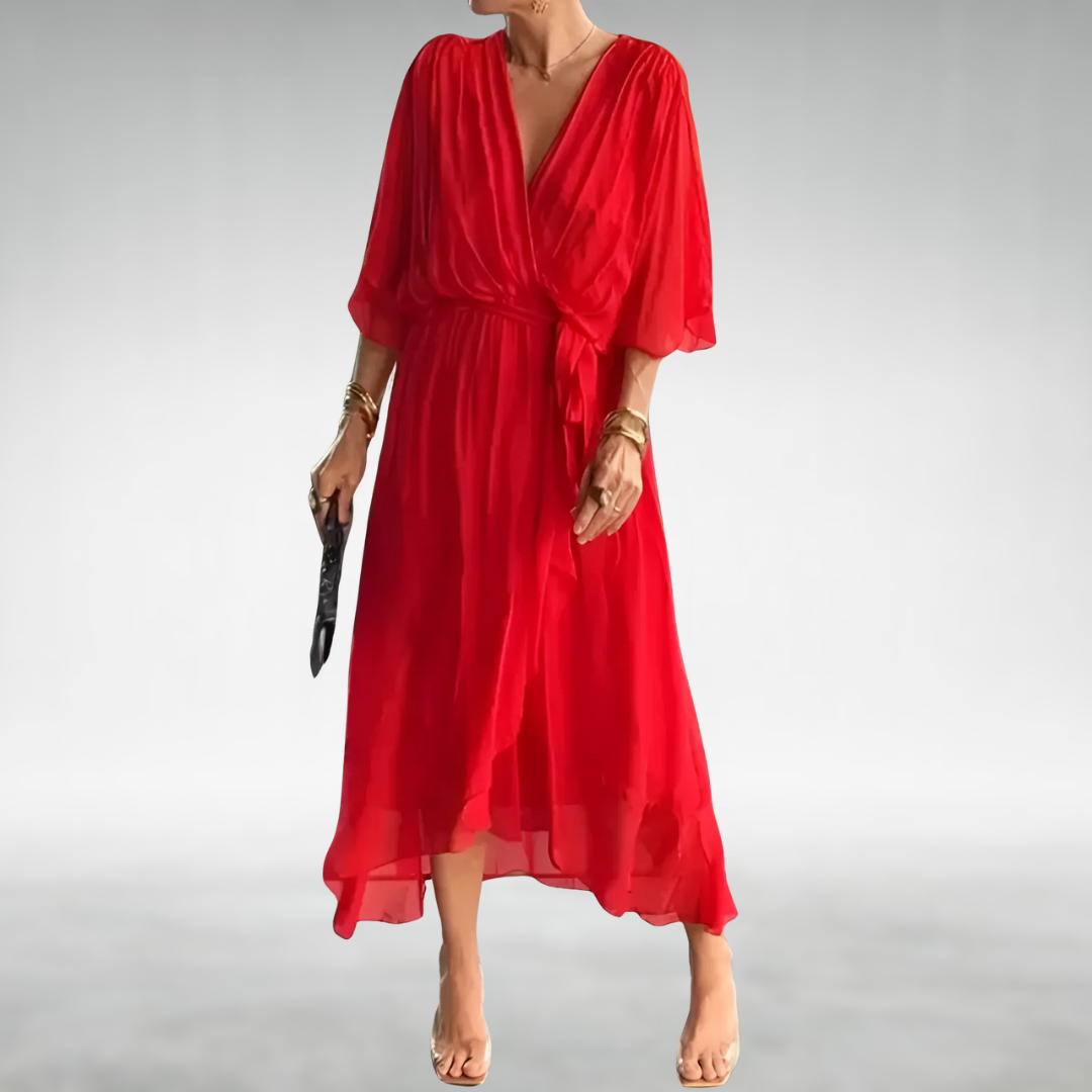Elegant wedding guest maxi dress in chiffon with V-neckline, full length lifestyle shot