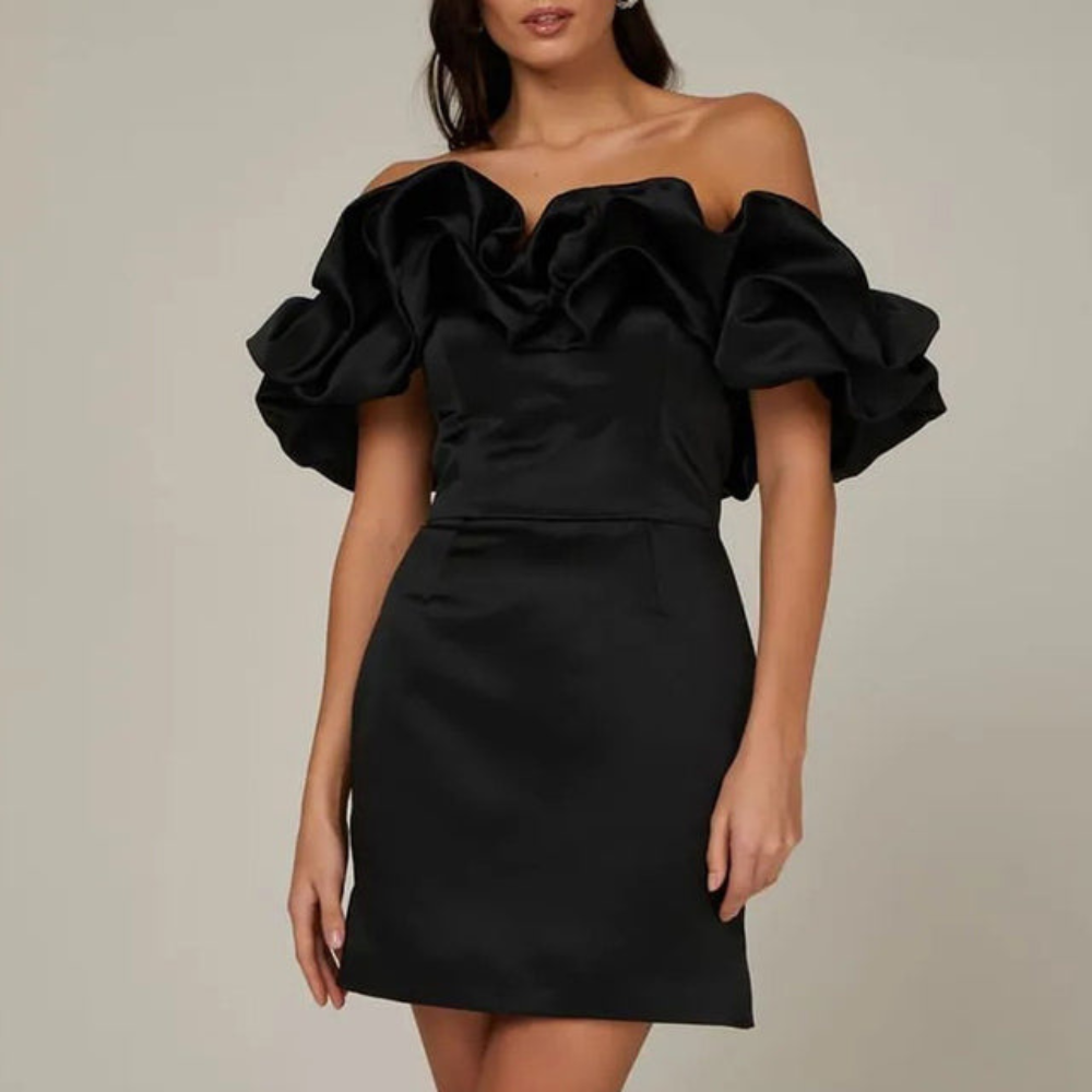 Women's strapless ruffle mini dress, side view