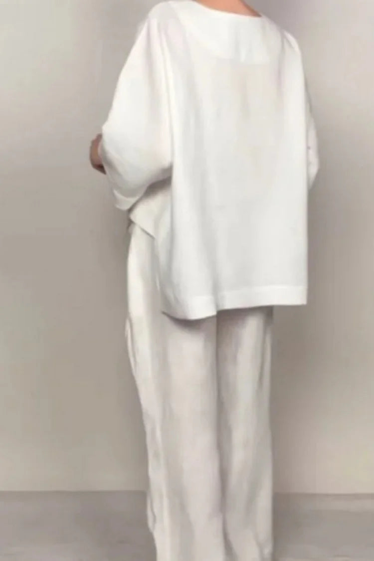 Minimalist co-ord set in grey, practical pockets and relaxed trousers | Alba Muse