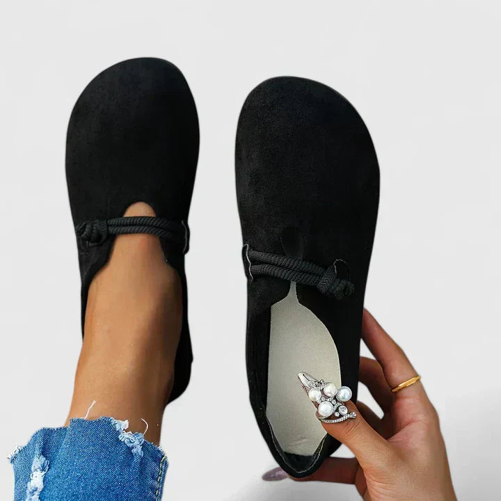 Women's comfortable ergonomic loafers showing supportive footbed detail