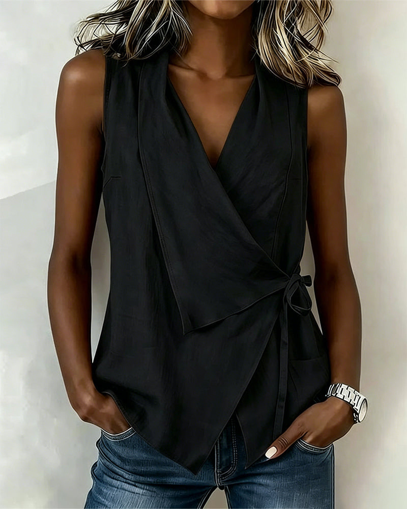 Sleeveless wrap front tie tank top in black, front view