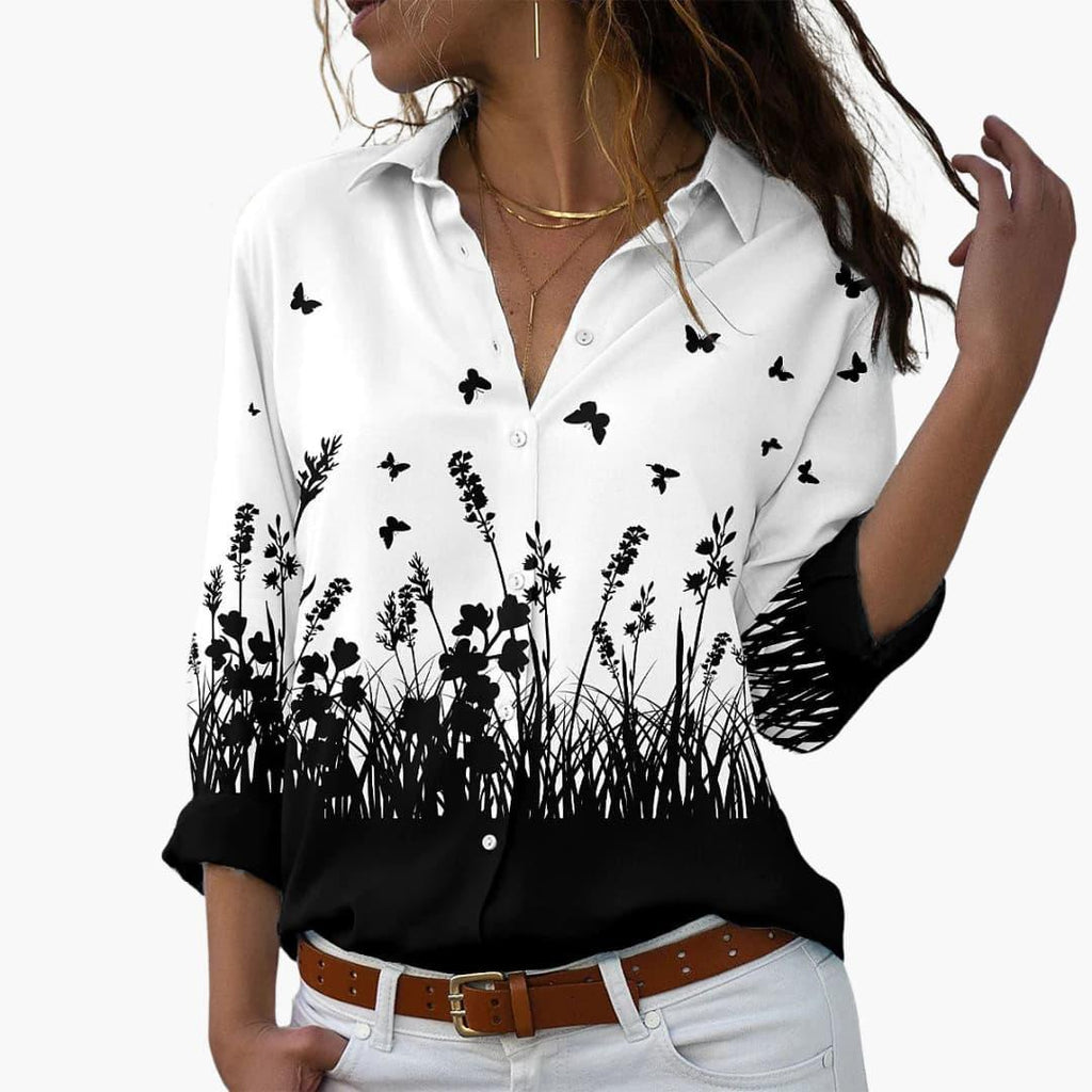 Sky blue floral top three-quarter view