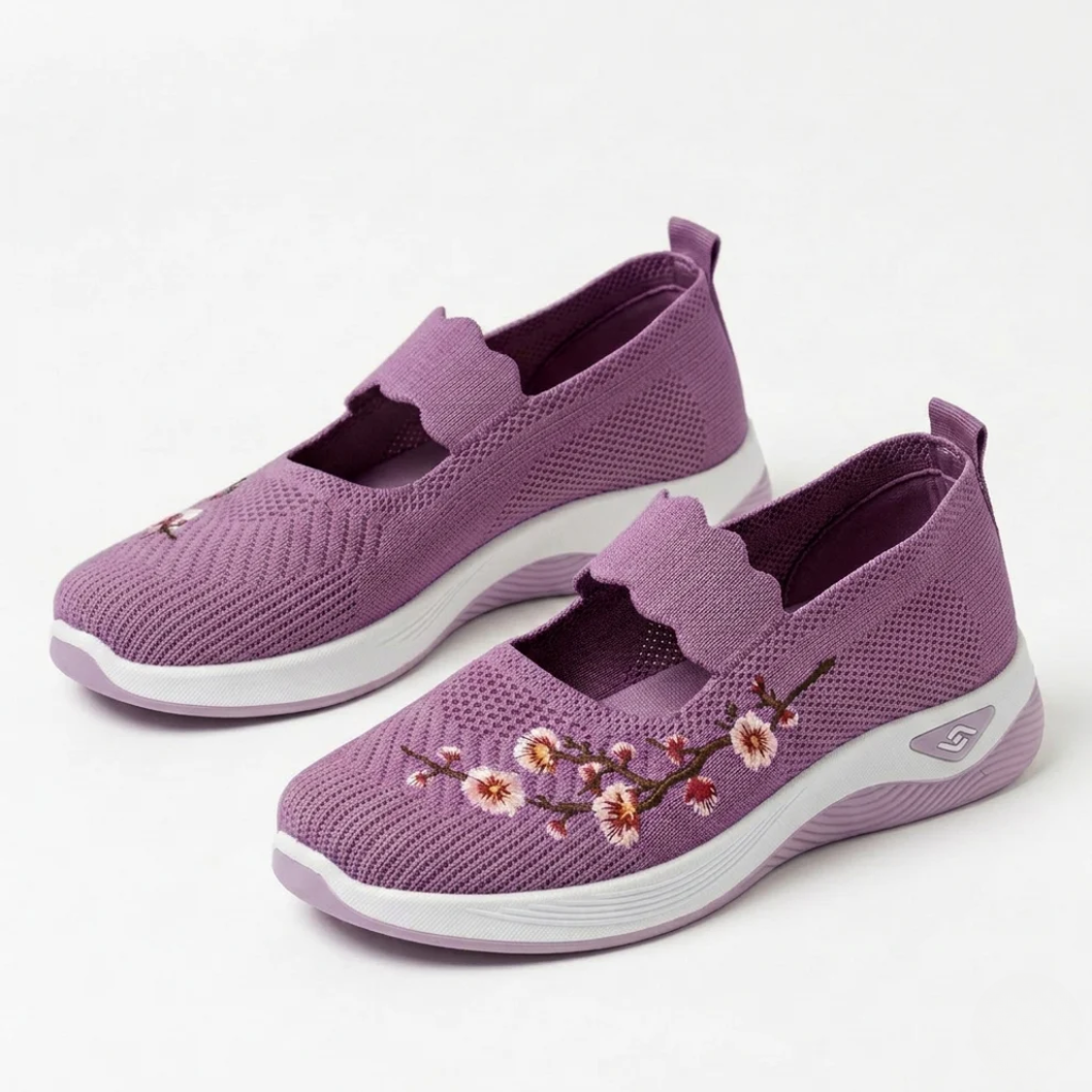 Women's non-slip trainers close-up of knit mesh upper and sole