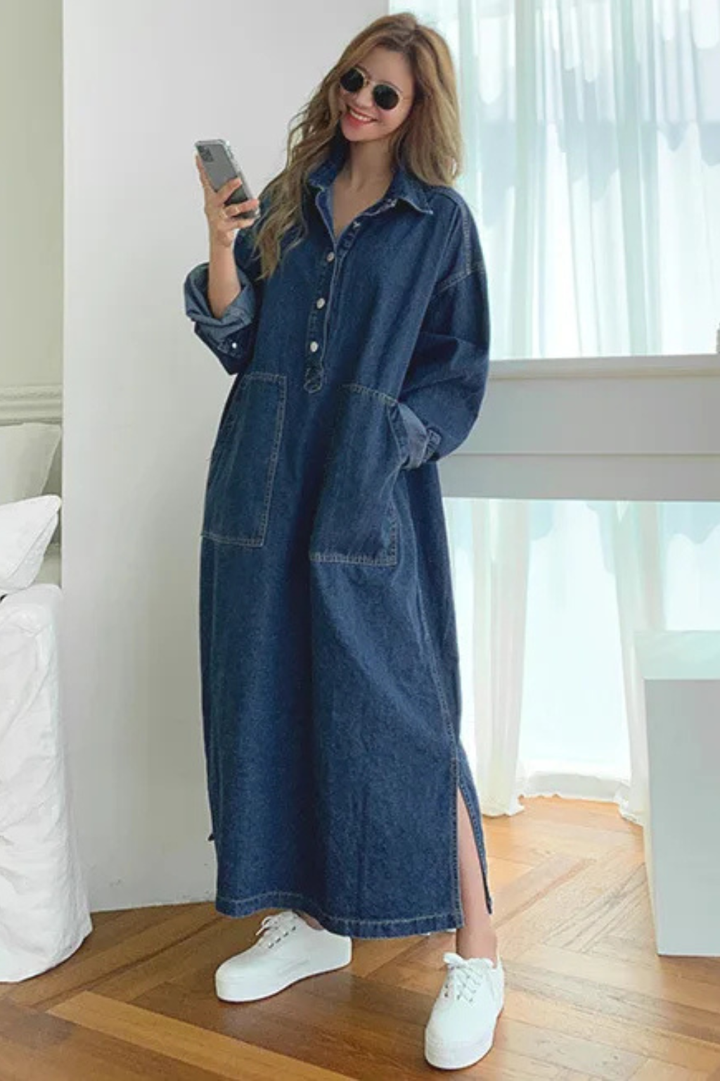 Women's oversized long sleeve denim maxi dress, full length lifestyle view