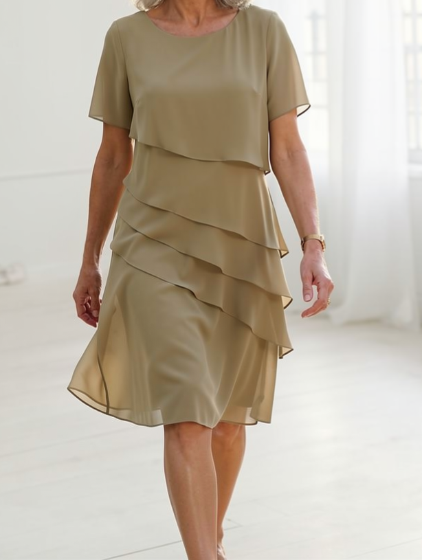 Women's ruffle midi dress with sheer sleeves, model full length