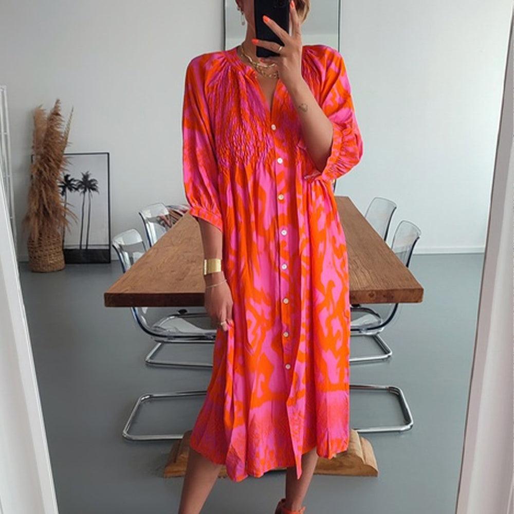 Hot pink and orange print shirred button front midi dress, front view on model