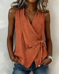 Sleeveless wrap front tie tank top in orange, front view