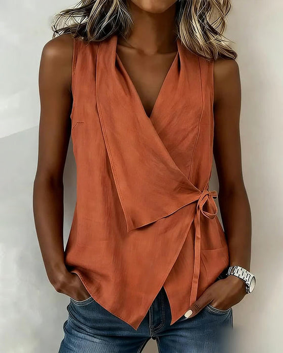 Sleeveless wrap front tie tank top in orange, front view