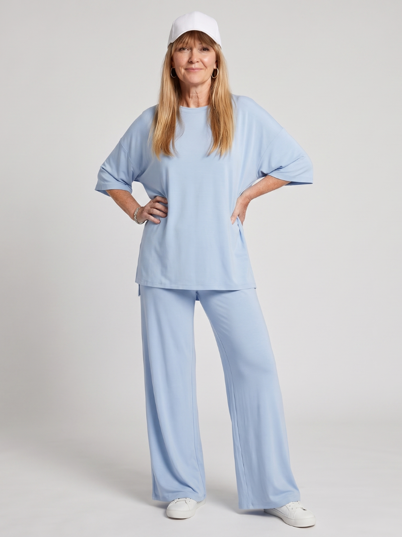 Side view of women's short sleeve oversized wide leg pants set