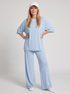 Side view of women's short sleeve oversized wide leg pants set