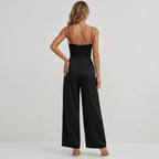 Women's pleated wide leg jumpsuit with self-tie high waist belt, side view