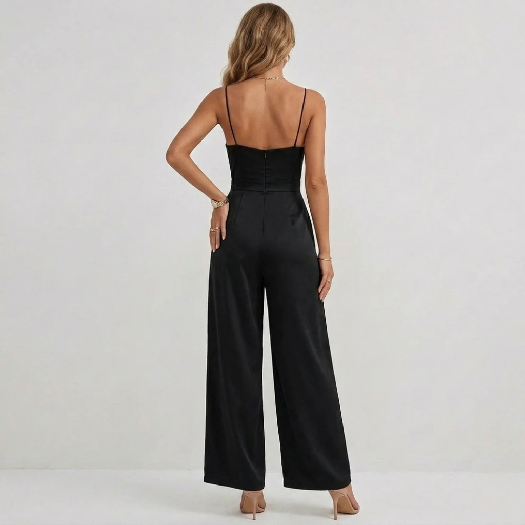 Women's pleated wide leg jumpsuit with self-tie high waist belt, side view