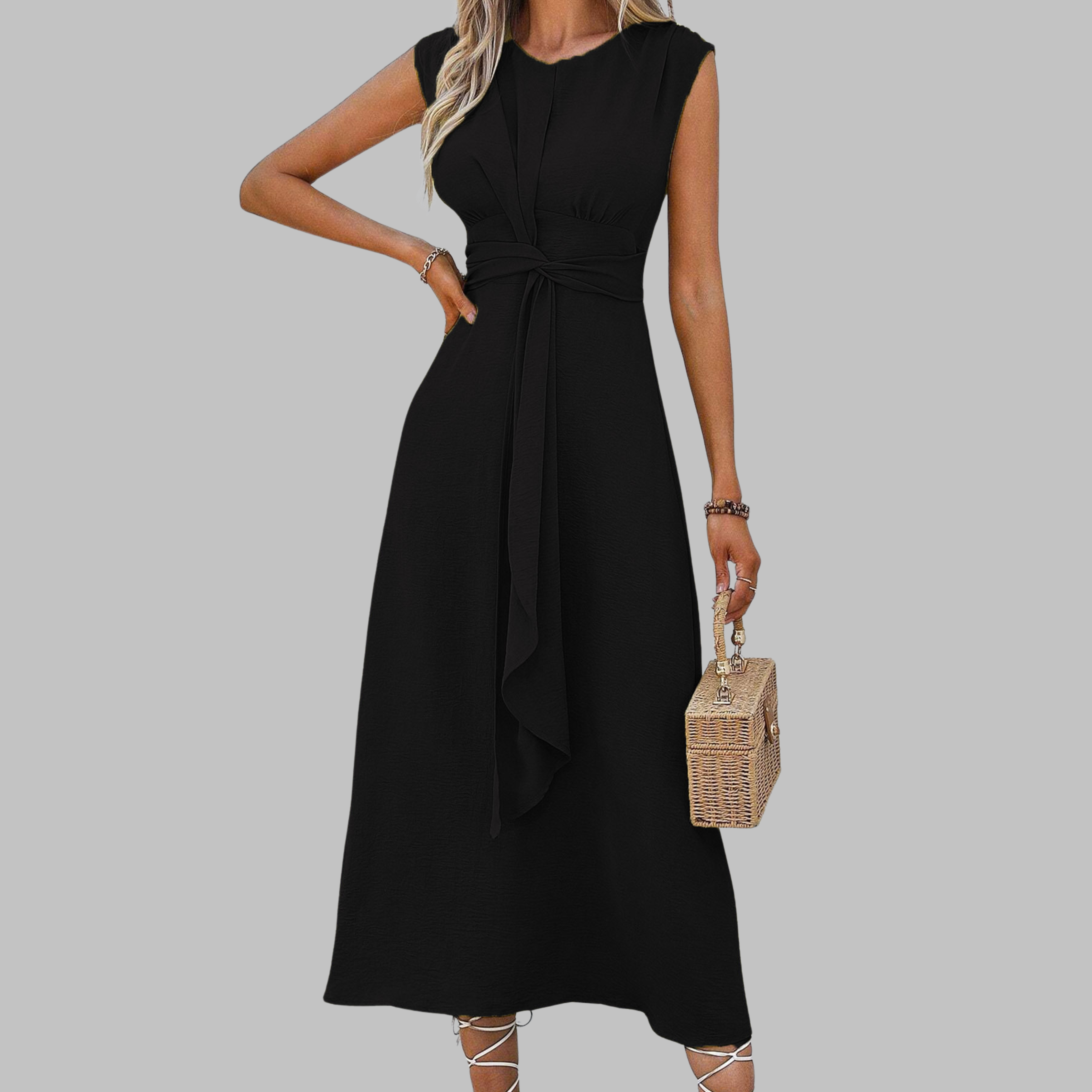 Sleeveless belted midi dress in summer styling, casual elegance