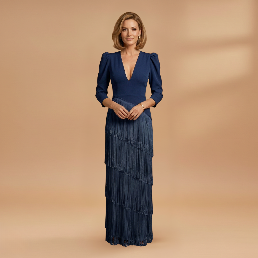 Women's banquet dress full length view with tassel hem detail