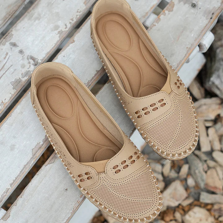 Women's rounded toe loafers in beige, back view