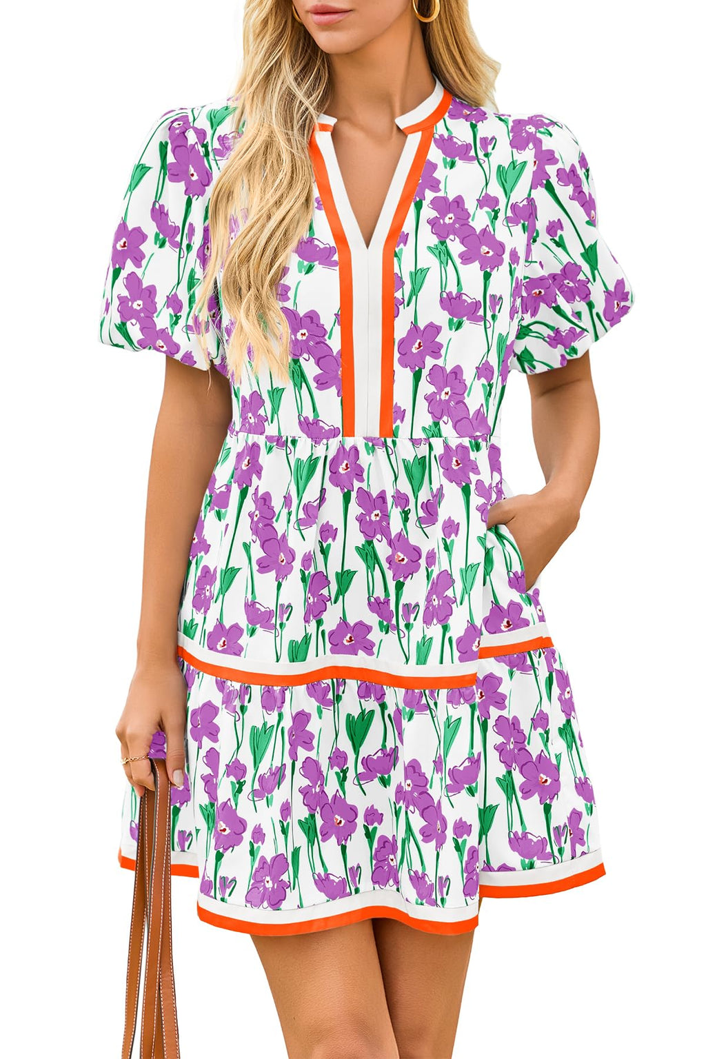 Women's floral patchwork puff sleeve mini dress styled for festivals