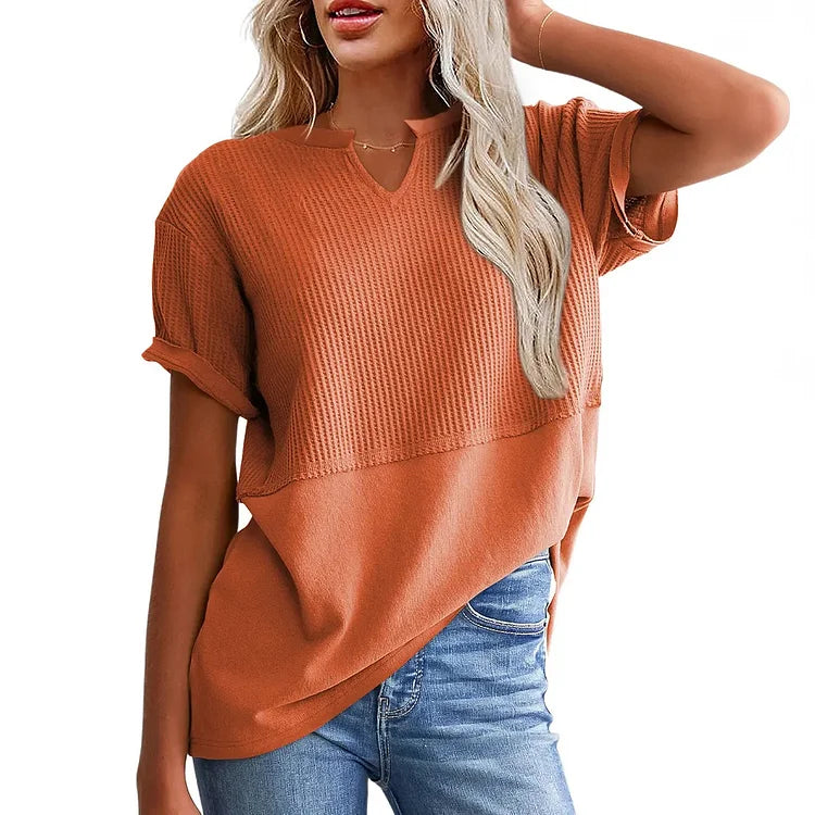 Women's waffle knit V-neck top, model showing loose silhouette | Alba Muse