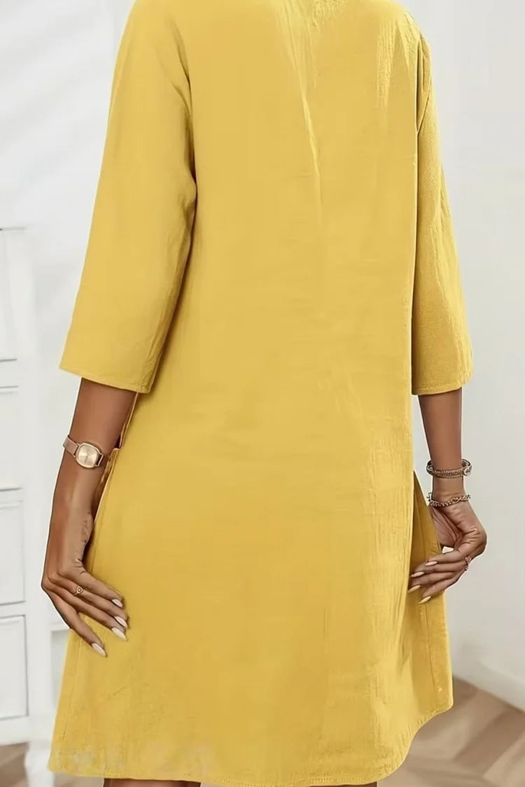 Solid colour loose midi dress side view, elegant everyday style | Alba Muse