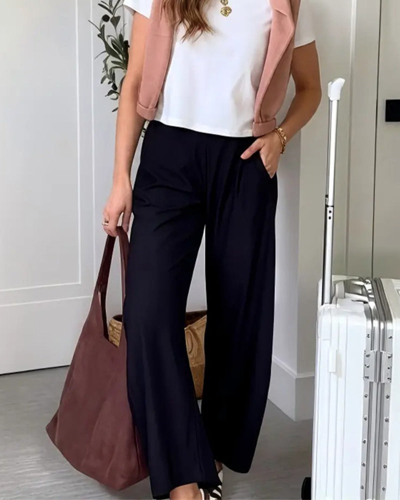 Solid colour hanging pocket trousers, styled view