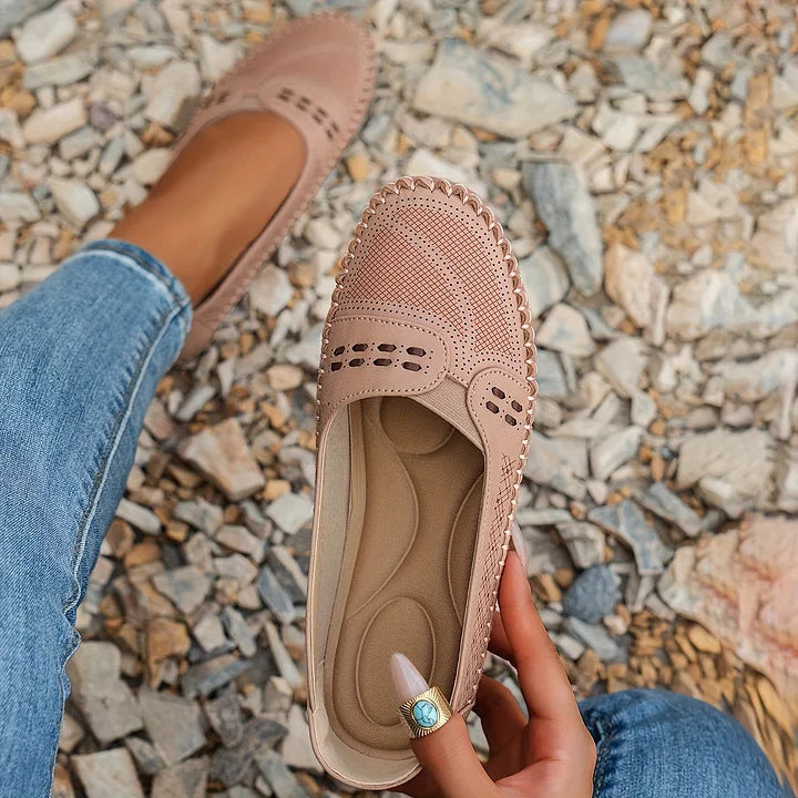 Women's flat loafers in brown, angled view