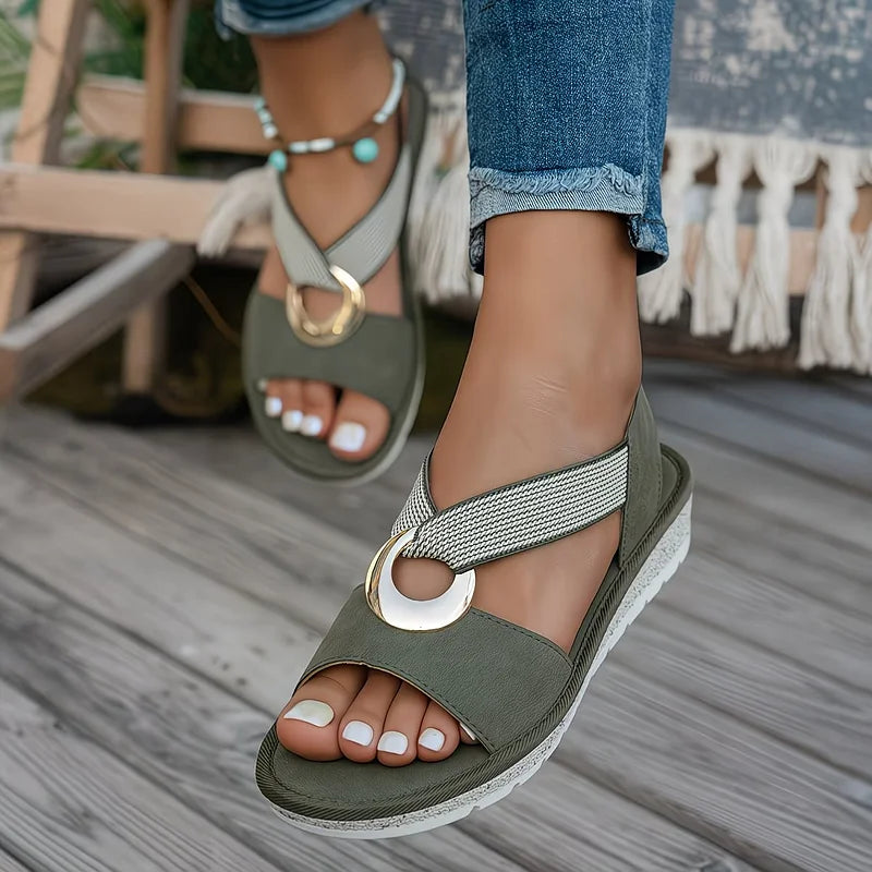 Flat slingback sandals with metal ring in beige, side view