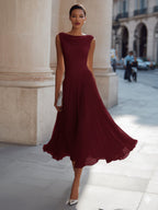 Draped neck sleeveless midi dress, back view in white