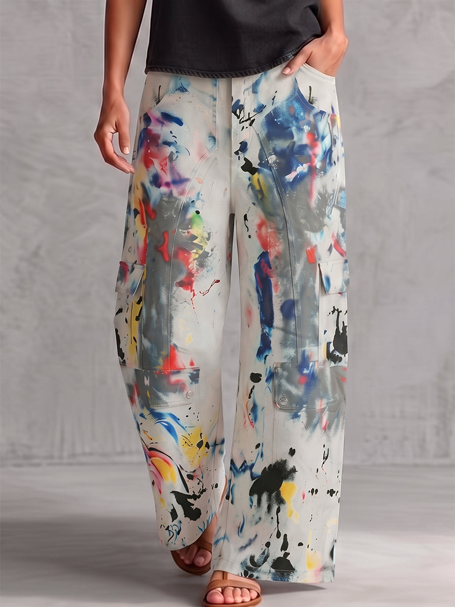 Off-white graffiti-print wide-leg high-waisted jeans with cargo pockets, front view