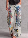 Off-white graffiti-print wide-leg high-waisted jeans with cargo pockets, front view
