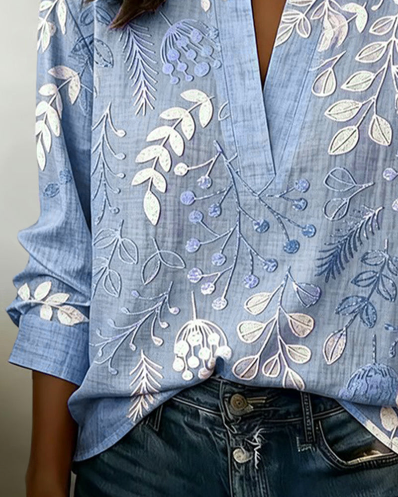 Women's floral high-neck blouse in purple, side view