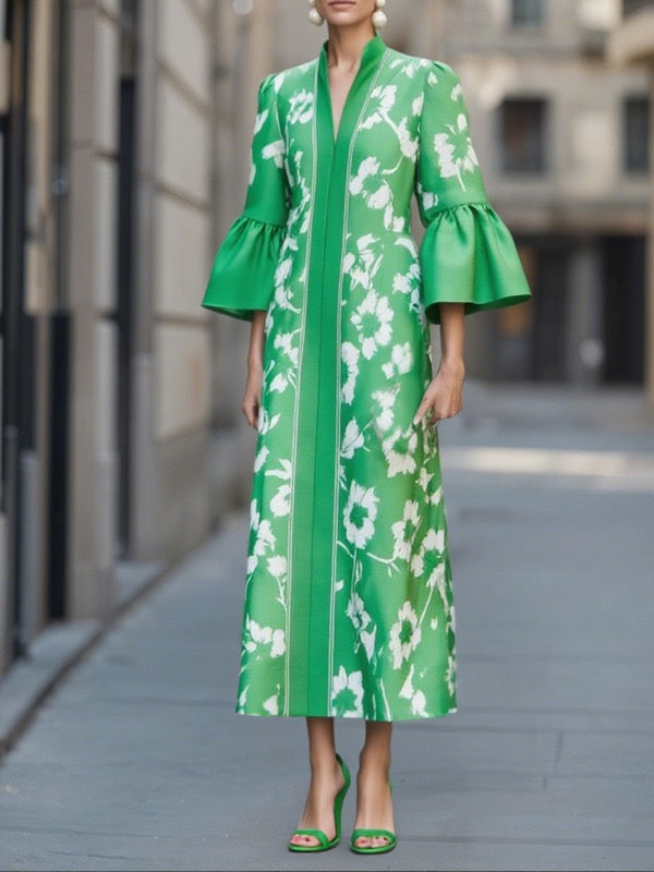 Green floral print maxi dress with flared bell sleeves and V-neckline, close-up front view