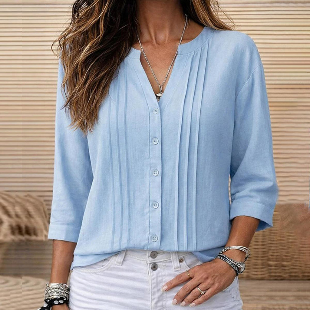 Women's light blue pleated button-front 3/4 sleeve blouse, front view