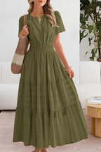 Women's boho midi dress with A-line silhouette, close-up of pattern detail