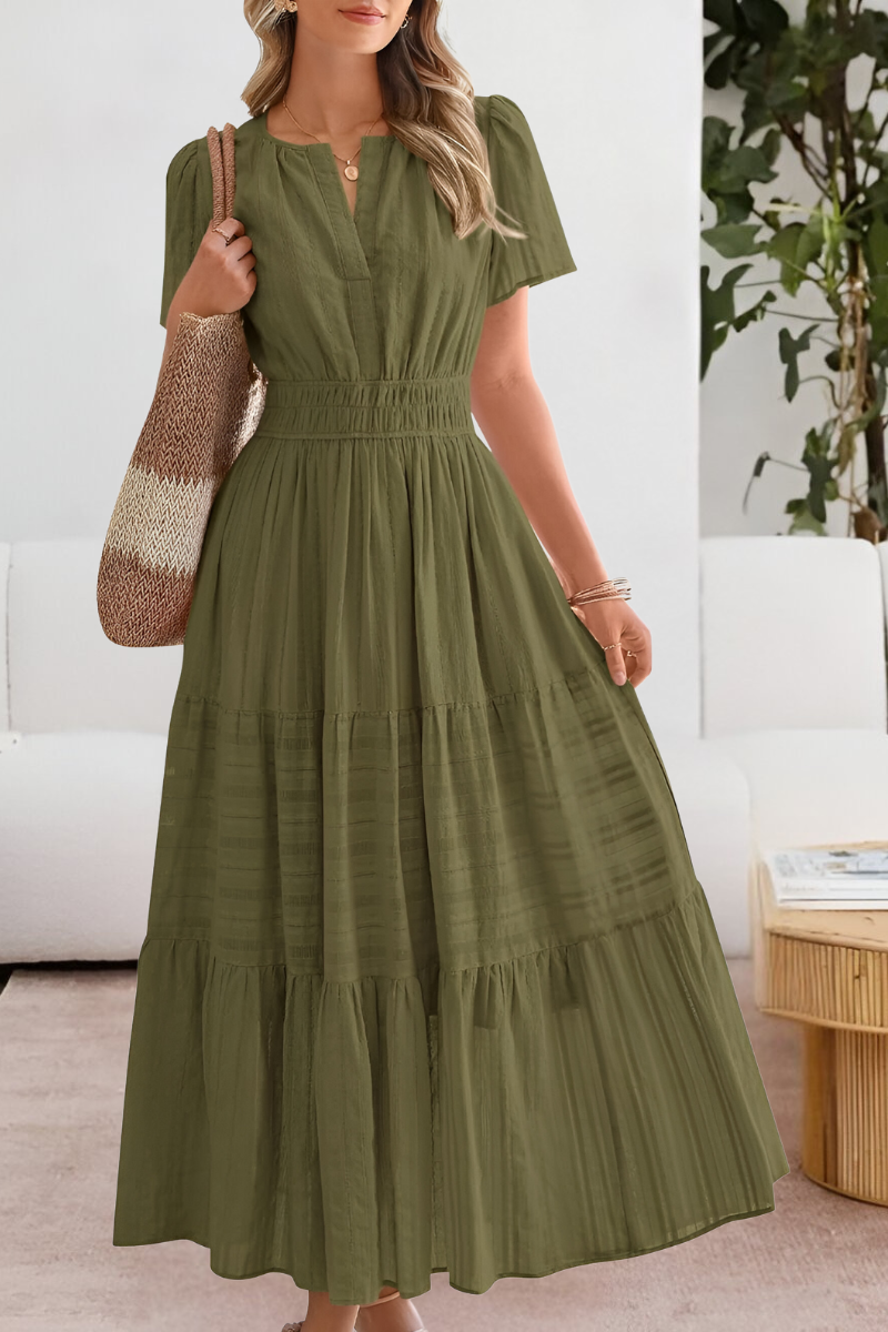 Women's boho midi dress with A-line silhouette, close-up of pattern detail