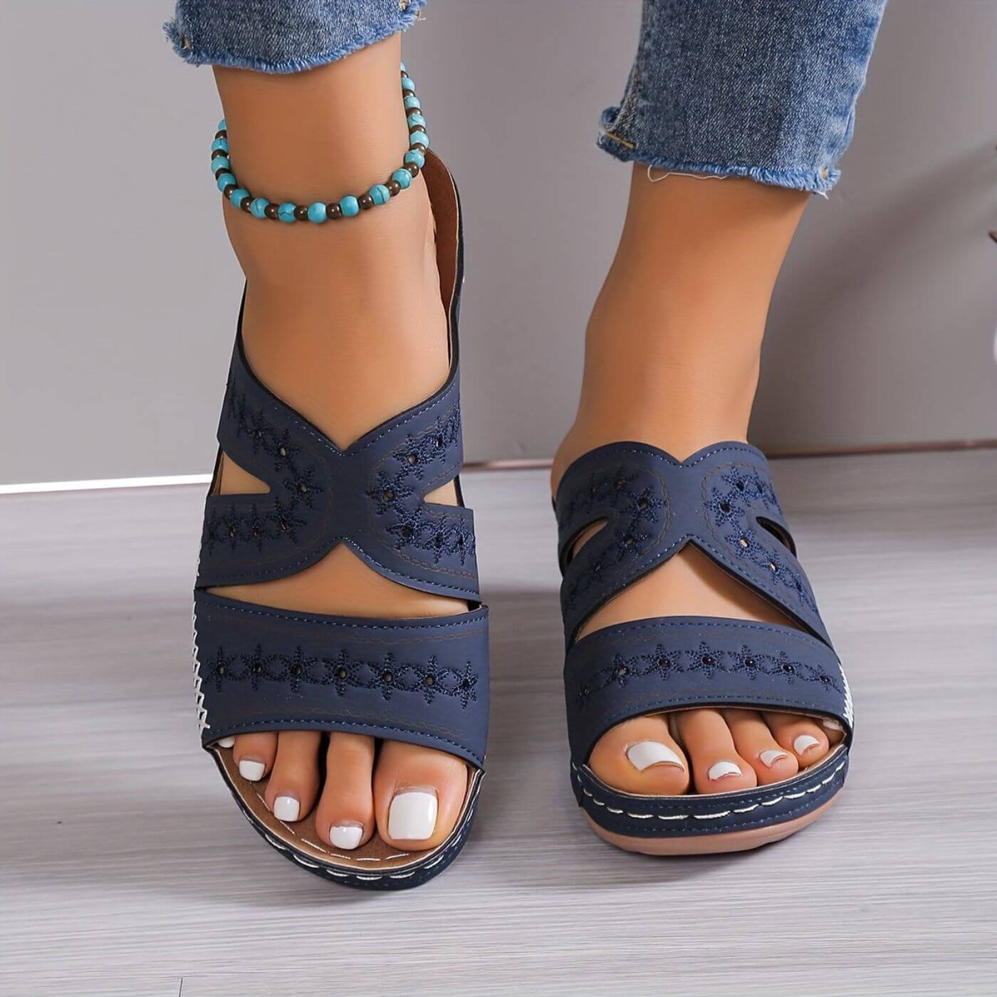 Women's orthopaedic gel-sole sandals in blue, back view