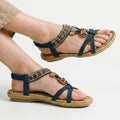 Stylish orthopedic comfort sandals in cobalt blue, side view