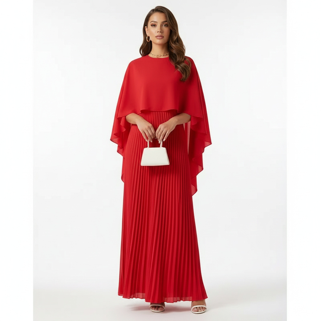 Women's wedding guest maxi dress with pleated skirt and cape overlay in red, front view