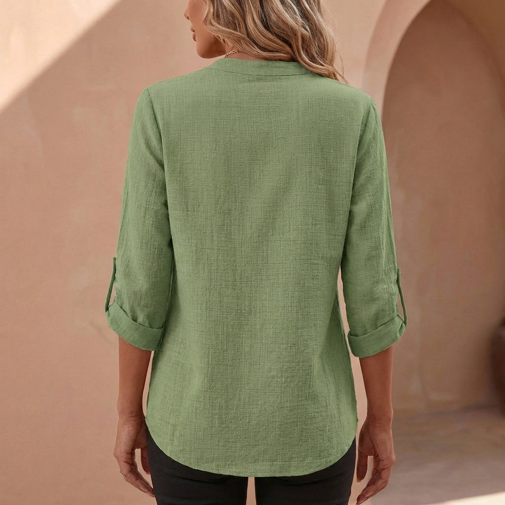 Women's linen blouse with band collar styled for smart-casual