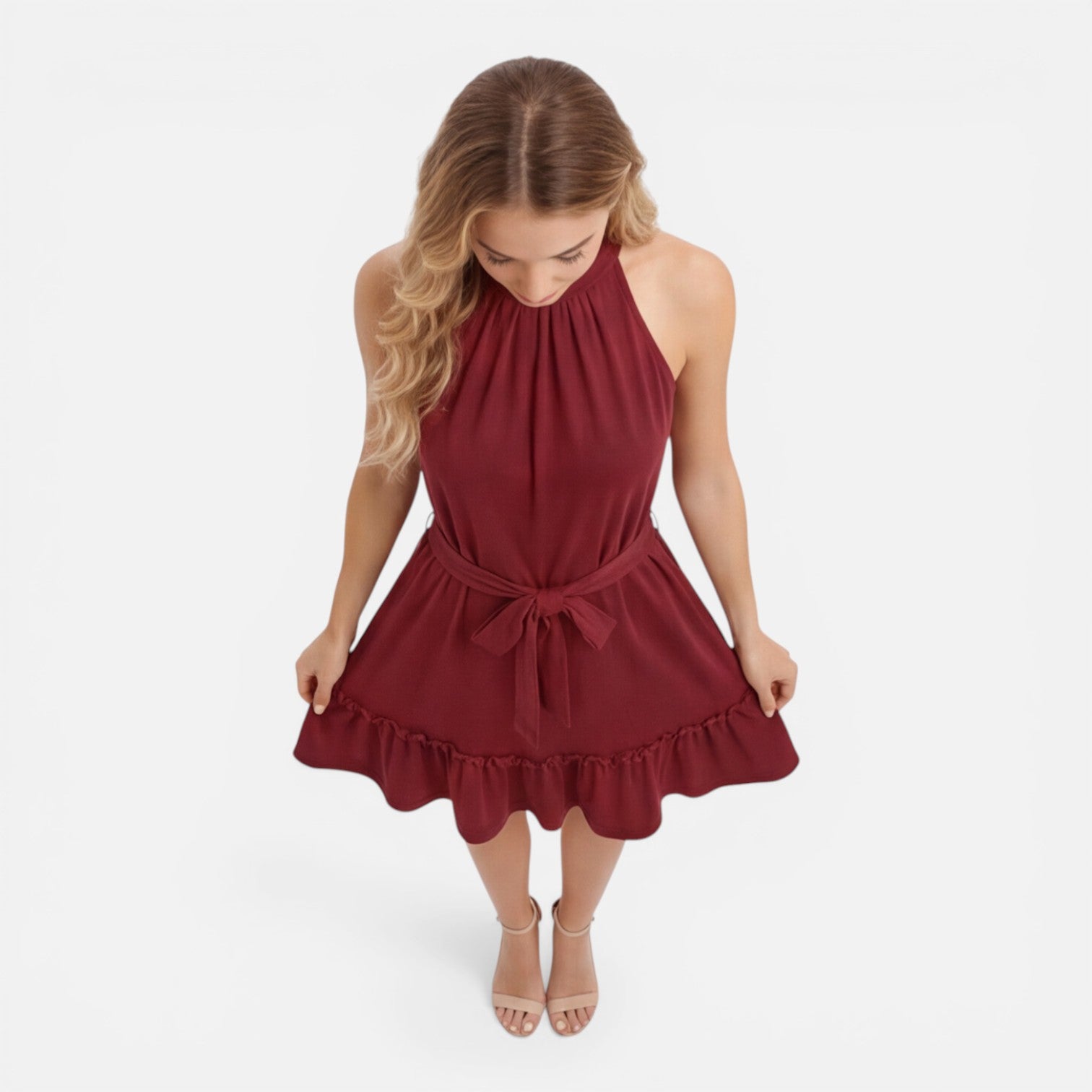 Halter neck mini dress styled for summer occasions