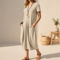 V-neck casual midi dress with pockets in Beige, front view