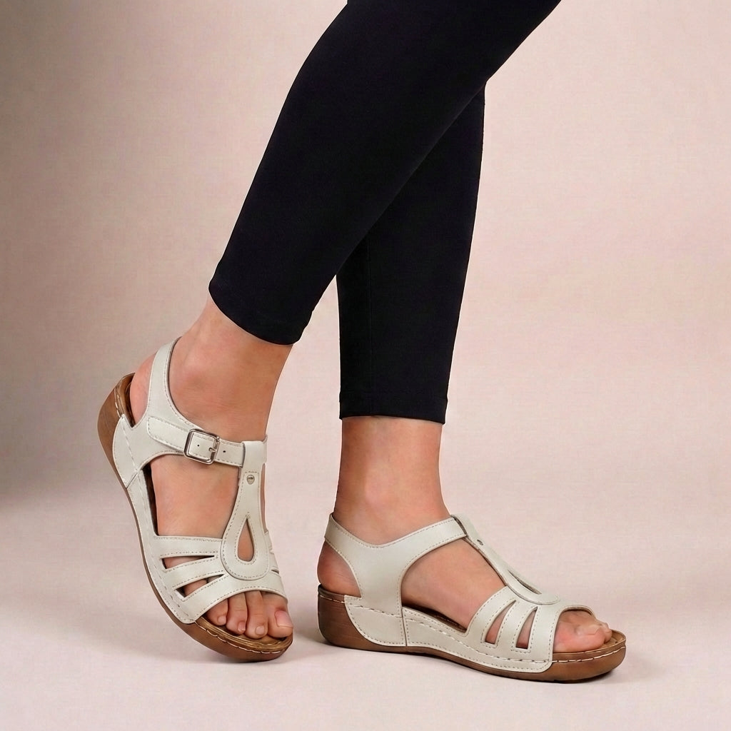 Cut-out detail T-strap flat wedge sandals – heel and sole detail